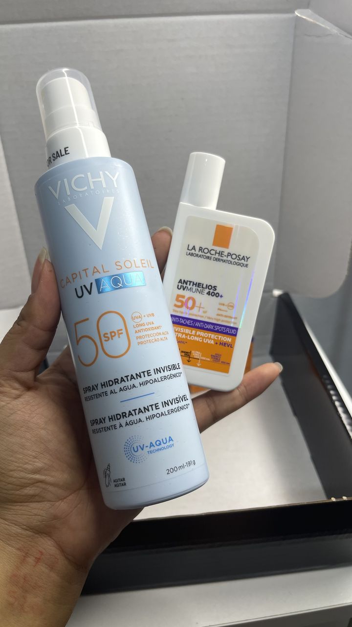Protetor solar Vichy e La Roche-Posay na mão